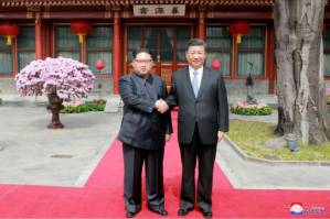 Xi Jinping and N. Korea's Kim Jong Un meet in China.jpg