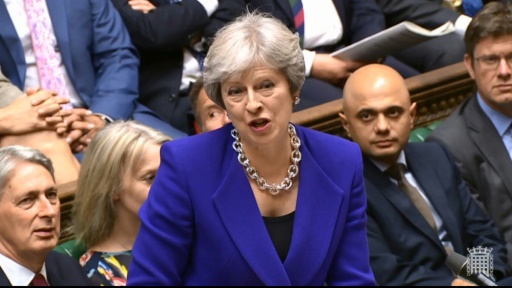 May survives rebel MPs but EU's Brexit judgment looms
