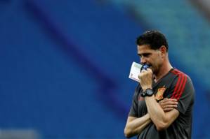 Shellshocked Spain face Portugal in early World Cup treat.jpg