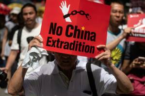 Hong Kong businesses pledge closures as extradition anger builds.jpg