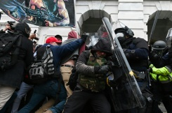 Report on Capitol Hill riot criticizes police preparation, response.jpg