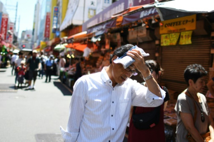 Heat risks add to challenges for Tokyo's pandemic-hit Olympics.jpg