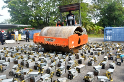 Malaysian police steamroll bitcoin machines.jpg