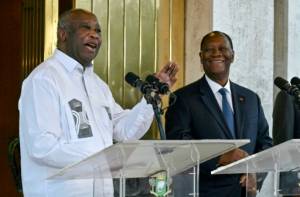 Ivory Coast's Ouattara says after greeting rival.jpg