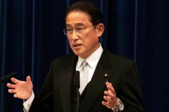 Japan unveils record $490 bn stimulus to boost pandemic recovery