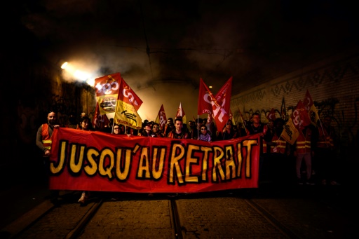 French unions dig in after Macron defends pension reform