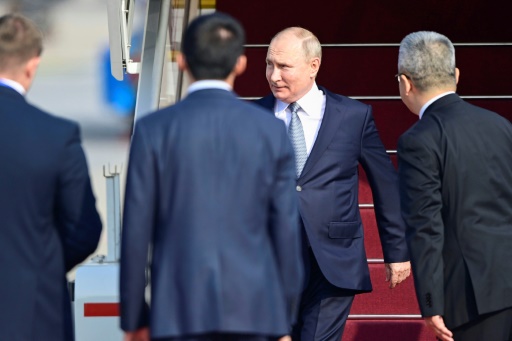 Putin in China to meet 'dear friend' Xi