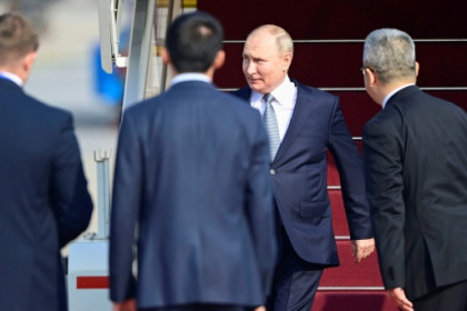 Putin in China to meet 'dear friend' Xi.jpg