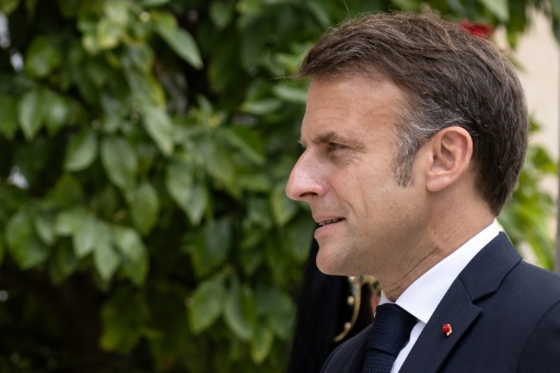 Macron pledges 'change' as French far right eyes parliament rout