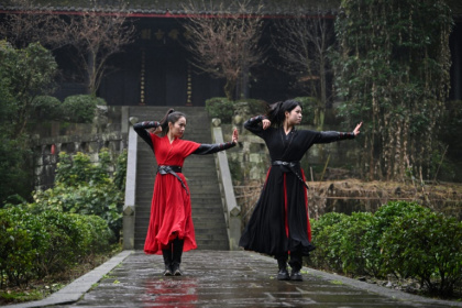 The all-woman Emei Kung Fu Girls troupe records slick videos of their skills, attracting renewed public interest in their ancient martial arts school