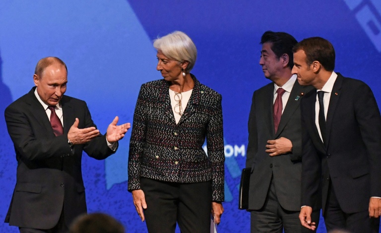 Putin T-shirts, robots and the Taliban -- but few Westerners at Russia's Davos