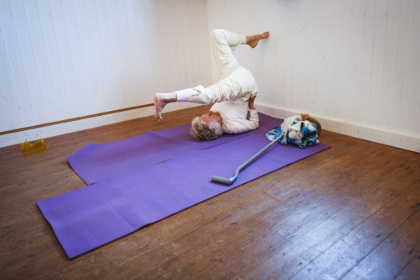 The war veteran celebrated her 100th birthday in October but still teaches yoga to a class of students - Adrian DENNIS (AFP)
