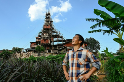 Chen Tianming refused to leave his village, which was mostly razed to build a tourist resort - Pedro PARDO (AFP)