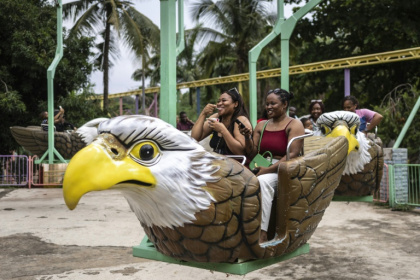 Roller coasters, carousels and carnival rides dot the Magicland amusement park in the capital, Abuja - OLYMPIA DE MAISMONT (AFP)