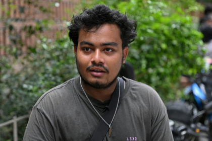 The memory of police with shotguns twice blasting the young protester beside him still haunts Hibzur Rahman Prince - MUNIR UZ ZAMAN (AFP)