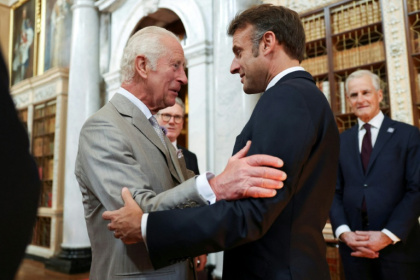 French President Emmanuel Macron is the first European leader to be invited for a state visit since King Charles III assumed the throne - Hollie Adams (AFP)