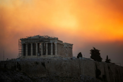 The 2,500-year-old Acropolis is built on a rock overlooking Athens - Angelos TZORTZINIS (AFP)
