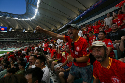Amateur football leagues springing up around China have drawn millions of viewers online, boosted domestic tourism to lesser-known locales and sparked good-natured rivalry between cities - Hector RETAMAL (AFP)