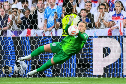 Goalkeeper Hannah Hampton starred in the penalty shootout as England defended their Women's Euro crown - SEBASTIEN BOZON (AFP)