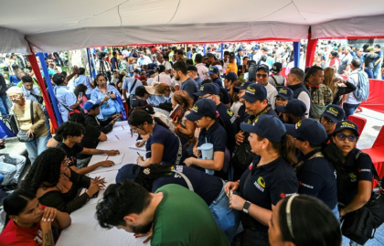 Thousands line up to join the civilian militia in Venezuela after President Nicolas Maduro warned of possible US invasion - Juan BARRETO (AFP)