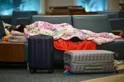 More than 10,000 flights to or from the United States experienced delays last weekend, according to tracking service FlightAware - Miguel J. Rodriguez Carrillo (AFP)