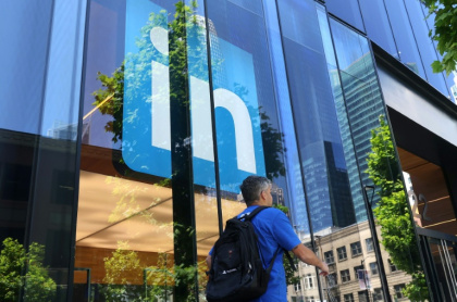 Women who saw their engagement spike on LinkedIn after adopting a male identity are calling for greater transparency around the algorithm - JUSTIN SULLIVAN (AFP)