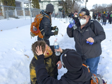 Wednesday's incident came during protest action against immigration enforcement in southern Minneapolis, Minnesota - Kerem YUCEL (AFP)