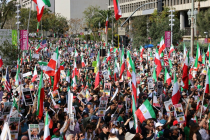 Protesters held flags and placards during a rally in solidarity with protesters in Iran in Los Angeles - Jonathan Alcorn (AFP)