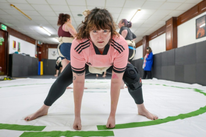 Toraigh Mallon poses for a photo during a training session at a sumo wrestling club in Belfast - Paul Faith (AFP)