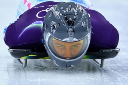 Ukraine's Vladyslav Heraskevych wears a helmet depicting Ukrainian sportsmen and women during a skeleton training session at the Winter Olympics - FRANCK FIFE (AFP)
