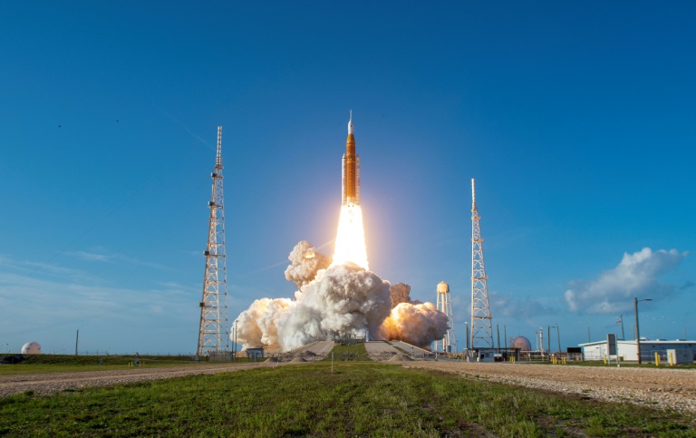 Astronauts begin NASA lunar mission after climactic blast-off