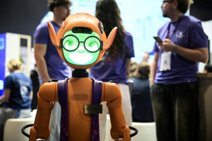 Mirokai from France's Enchanted Tools already welcomes people at hospitals and airports - JULIEN DE ROSA (AFP)