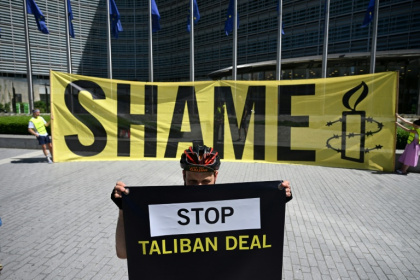 Amnesty International staged a protest outside the European Commission headquarters in Brussels to protest against a meeting with a visiting Taliban delegation - Nicolas TUCAT (AFP)