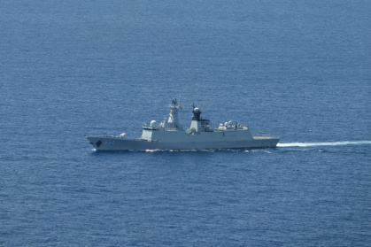 A ship identified by the Philippine Coast Guard as a Chinese Navy vessel is seen near Scarborough Shoal in the disputed South China Sea on June 15, 2026 - Jam STA ROSA (AFP)