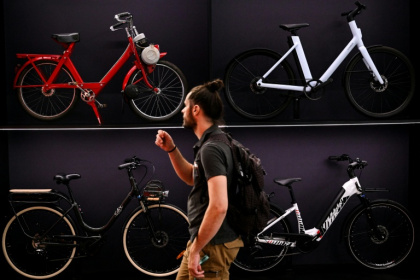 A man walks past bikes on display at a booth at the EUROBIKE 2026 fair in Frankfurt - Kirill KUDRYAVTSEV (AFP)