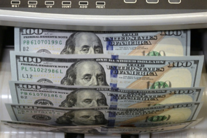 Last year, nearly a million people became dollar millionaires - JUAN MABROMATA (AFP)