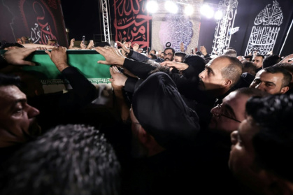Iraqi officials and senior politicians received the remains of Khamenei on Tuesday night at Najaf international airport - - (AFP)