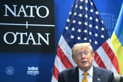 US President Donald Trump swung from antagonism to affection with his NATO allies at the summit, ending on a high note - SAUL LOEB (AFP)