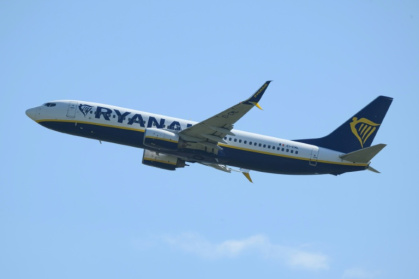 Ryanair said the flight returned to Thessaloniki after the window 'detached', with witnesses describing fellow passengers pulling the man back inside - Ed JONES (AFP)