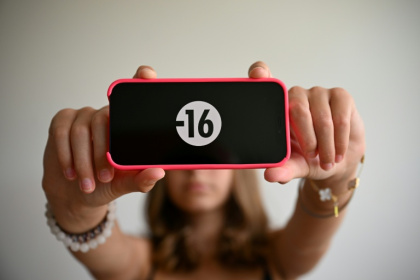 More than 20 countries around the world have restrictions on children's social media use - Nicolas TUCAT (AFP)