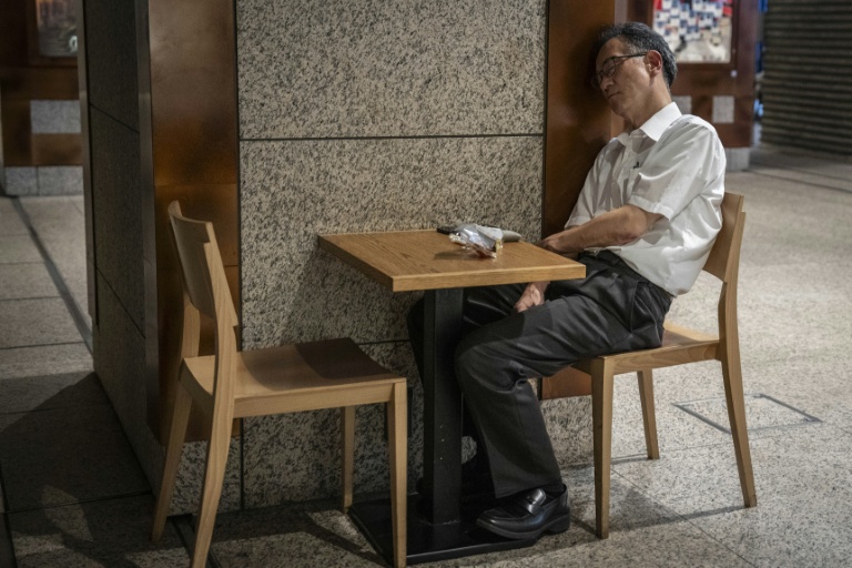 Japan to relax overtime regulation under workaholic PM