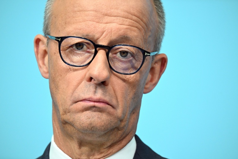 Germany's Merz 'shocked' by far-right state win but vows to stay course