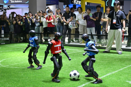 Humanoid robots, such as those produced by China's Booster Robotics, were banned from being imported to the United States after a White House task force concluded they posed security risks - Hector RETAMAL (AFP)