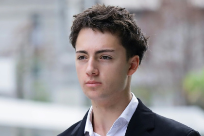French teenager Didier Gaspard Owen Maximilien arrives at the State Courts in Singapore on July 30, 2026 - Suhaimi Abdullah (AFP)