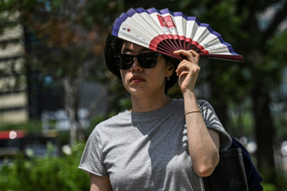 KMA data show the average annual number of heatwave days in the country has more than doubled to 19 over the past five years, from eight in the 1970s - JADE GAO (AFP)