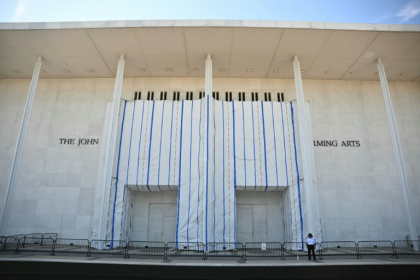 A large protective tarp covers part of the facade of the John F. Kennedy Center for the Performing Arts in Washington - Mandel NGAN (AFP)